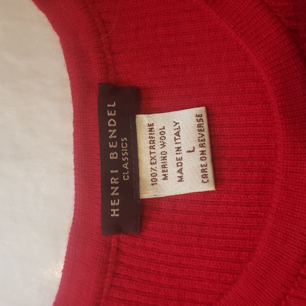 Red Henri Bendel Classics, shell or wear as a sleeveless top. 100% Merino Wool